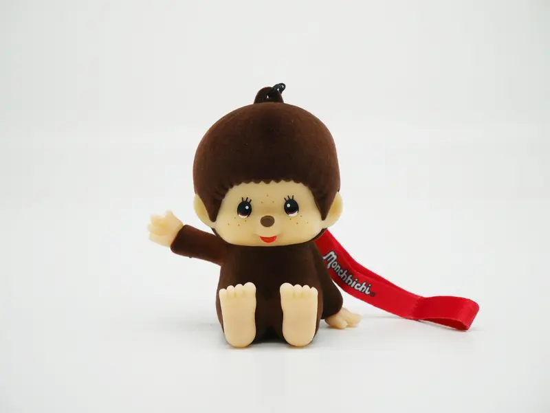 MONCHHICHI lumineux avec dragonne