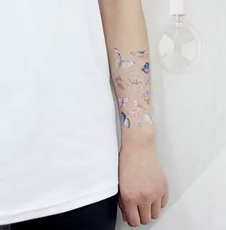 Tatouage Papillon Fille