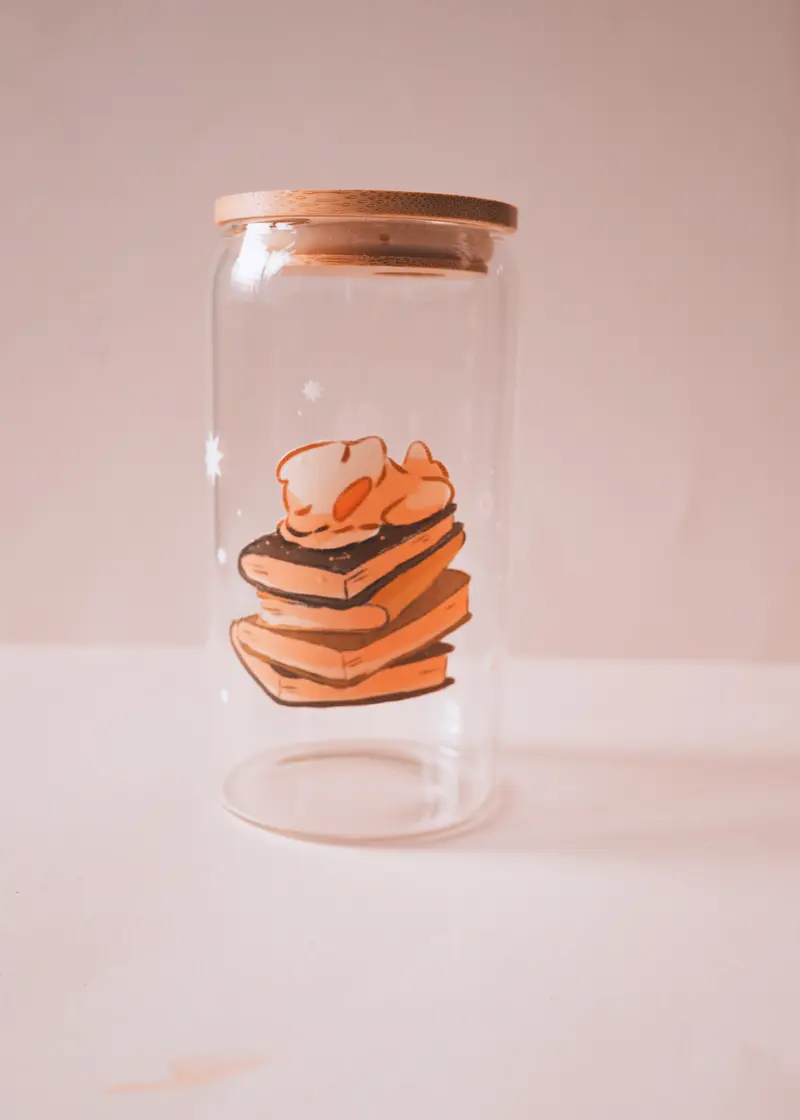Verre - Canard pile de livres
